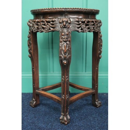 2008 - A 19TH CENTURY CHINESE HARDWOOD MARBLE TOPPED JARDINIERE STAND with shaped top over pierced carved f... 