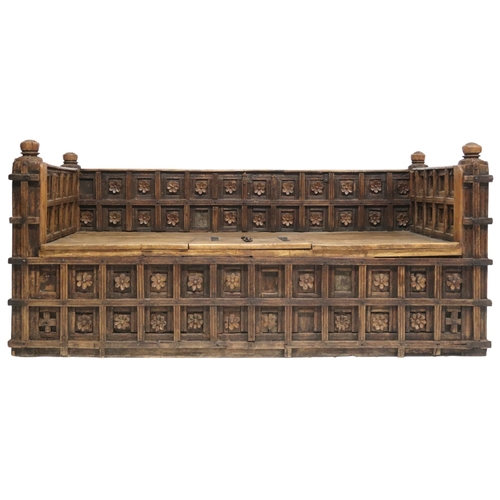 2010 - A LARGE 20TH CENTURY INDIAN HARDWOOD DAMCHIYA DOWRY CHEST panelled back carved with floral moti... 