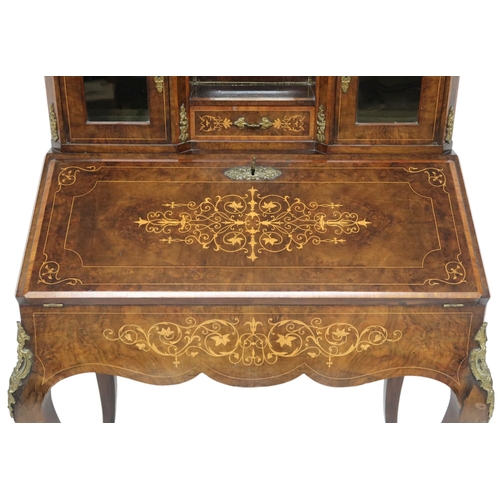 2012 - A 19TH CENTURY LOUIS XV STYLE WALNUT AND SATINWOOD INLAID BUREAU DE DAME desk with brass ormolu... 