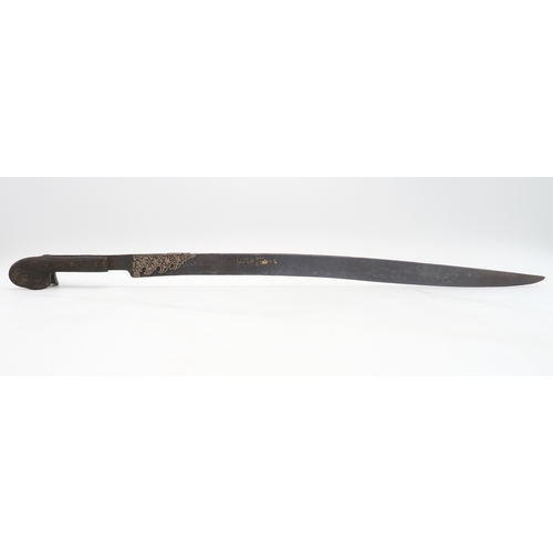 2602 - AN OTTOMAN YATAGAN SHORT SABREThe gently curved blade measuring approx. 59cm from grip to tip and re... 