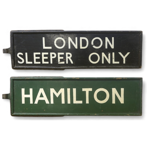 2636 - RAILWAYANA - A PAIR OF PAINTED WOODEN STATION BOARDS One black, reading 