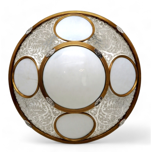 2110 - A 20TH CENTURY DECORATIVE CEILING LIGHTwith circular white glass panels, within a gilt and silvered ... 