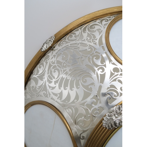 2110 - A 20TH CENTURY DECORATIVE CEILING LIGHTwith circular white glass panels, within a gilt and silvered ... 