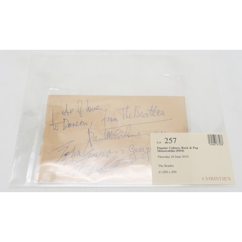 2641 - THE BEATLES - AUTOGRAPHS OF THREE MEMBERS ON ONE PAGEInscribed 