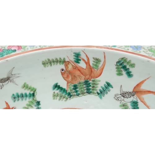 2409 - A CANTON FAMILLE ROSE BASIN Painted with two ladies at a window and surrounded by fish and aquatic f... 