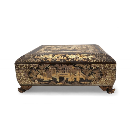 2410 - A CHINESE EXPORT BLACK AND GOLD LAQUERED GAMES BOXDecorated with figures before buildings and within... 