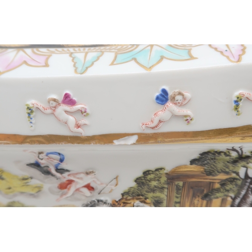 2206 - A LARGE CAPODIMONTE PORCELAIN BOX AND COVERof rectangular form, moulded in relief and painted with a... 