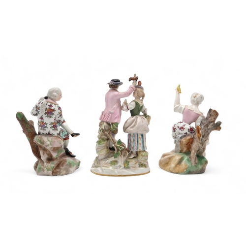 2207 - A GROUP OF MEISSEN FIGURESincluding after Victor Acier, a couple modelled standing with a dog at the... 