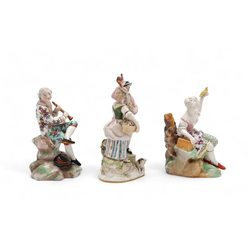 2207 - A GROUP OF MEISSEN FIGURESincluding after Victor Acier, a couple modelled standing with a dog at the... 