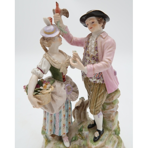 2207 - A GROUP OF MEISSEN FIGURESincluding after Victor Acier, a couple modelled standing with a dog at the... 