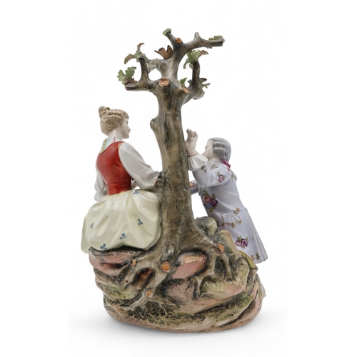 2208 - A MULLER VOLKSTEDT DRESDEN GROUPmodelled as a couple beside a tree with a lamb at their feet, 28cm h... 