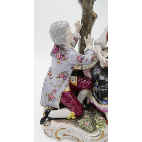 2208 - A MULLER VOLKSTEDT DRESDEN GROUPmodelled as a couple beside a tree with a lamb at their feet, 28cm h... 