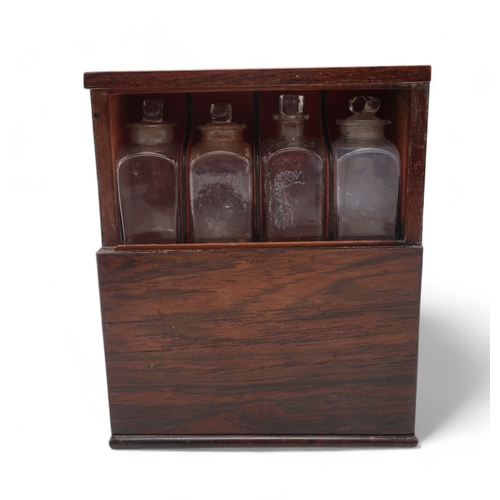 2212 - A 19TH CENTURY ROSEWOOD APOTHECARY TRAVELLING OR CAMPAIGN MEDICINE BOXinlaid with mother of pearl de... 