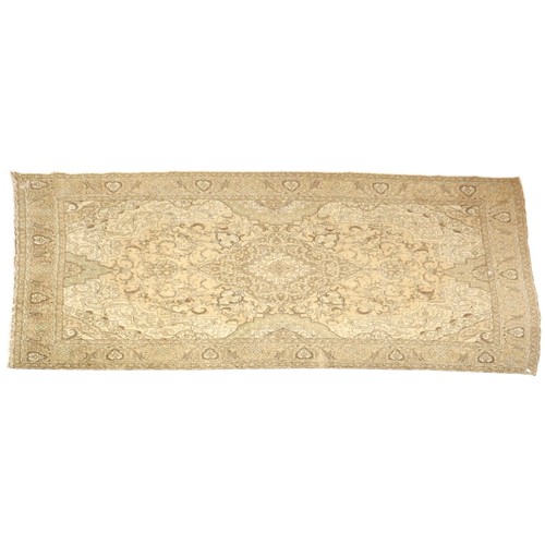 20 - A large beige ground Tabriz carpet with darker central medallion and spandrels on floral/foliate pat... 