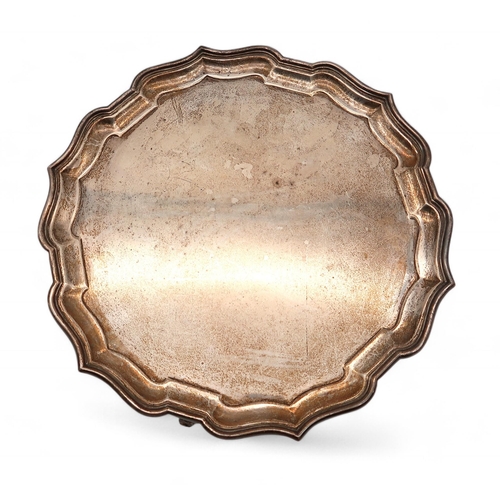 424 - A George V silver salver, by Adie Brothers Ltd, Birmingham 1931, with a chippendale pie crust rim, o... 