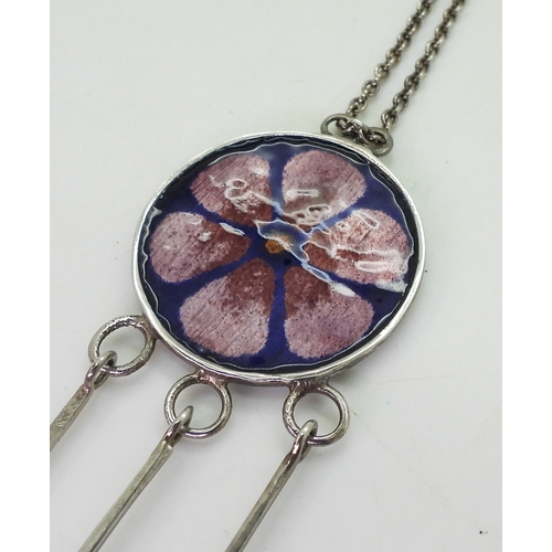 810 - A Norman Grant flower pendant the silver pendant with full hallmarks for Edinburgh 1973-74, further ... 