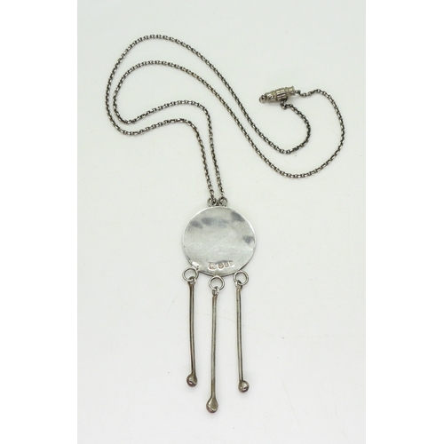 810 - A Norman Grant flower pendant the silver pendant with full hallmarks for Edinburgh 1973-74, further ... 