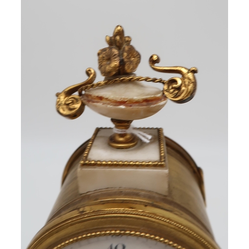 212 - A Le Roy, Paris mantle clock with candlestick garnitures, in white onyx with ormolu mounts