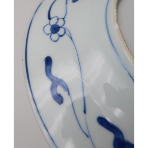 229 - A Chinese kraak style blue and white plate, decorated with alternating diaper panels and flowers, po... 