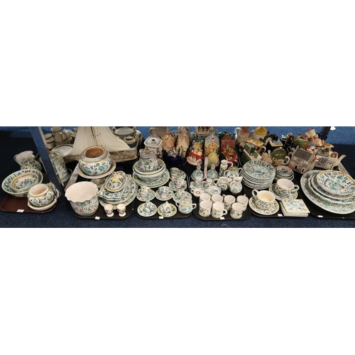 243 - An extensive matched Deruta breakfast, tea and dinner service with cups and saucers, mugs, teapot, c... 