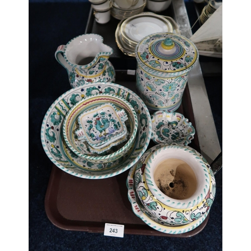 243 - An extensive matched Deruta breakfast, tea and dinner service with cups and saucers, mugs, teapot, c... 