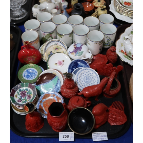 256 - A collection of Franklin Mint and porcelain collections, including cinnabar lacquer items, sake cups... 