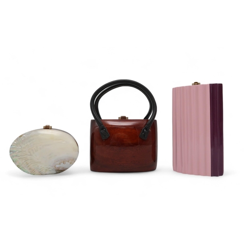 281 - Three Rocio luxury eco fashion acacia wood bags including a Oceana shell clutch, a ribbed pink and p... 