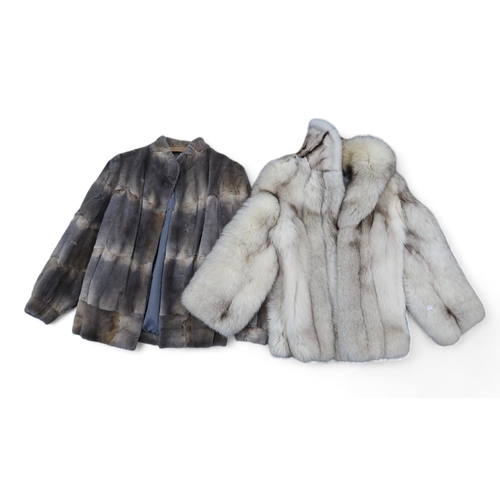 292 - Assorted fur coats including Artic fox, a Chinchilla,  two others, assorted beaded outfits etc