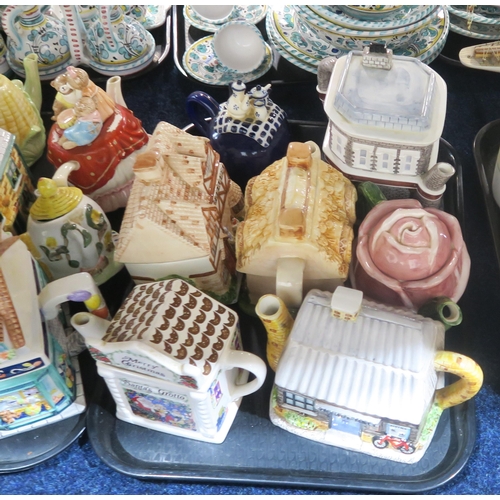 241 - A collection of novelty teapots