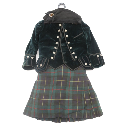 501 - A child's Highland dress outfit, comprising green velvet doublet and waistcoat, MacLeod tartan kilt ... 