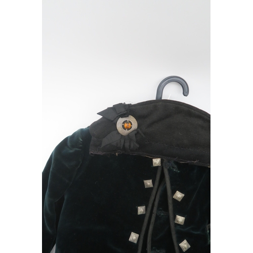 501 - A child's Highland dress outfit, comprising green velvet doublet and waistcoat, MacLeod tartan kilt ... 