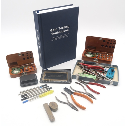 513 - A small quantity of jeweller's tools, scales etc.; together with a first edition copy of Gem Testing... 