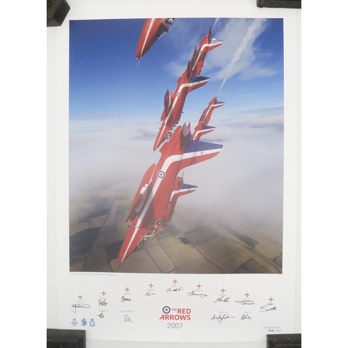 546 - The RAF Red Arrows - three various prints, all bearing pilots' signatures, one framed under glass an... 