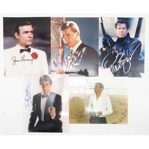 561 - James Bond: signed photographs of Sean Connery, Roger Moore, Timothy Dalton, George Lazenby and Pier... 