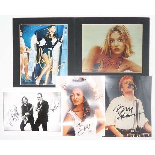 562 - AUTOGRAPHSSigned colour photographs of musicians Mariah Carey, Janet Jackson, Bryan Adams, Britney S... 