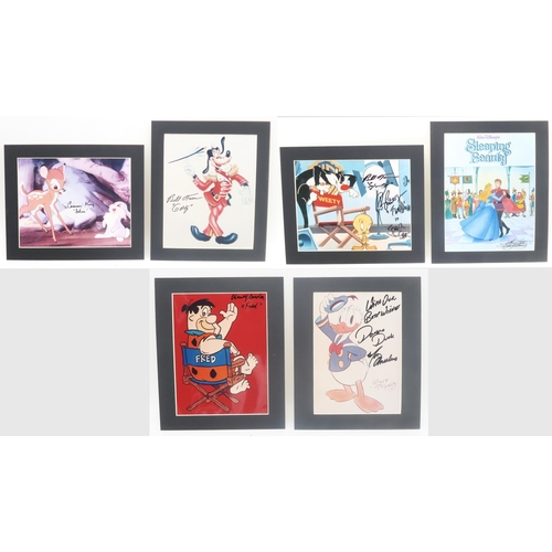 564 - AUTOGRAPHSA collection of colour prints autographed by stars associated with Disney and Hanna-Barber... 