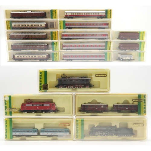 573 - A collection of Minitrix N-gauge model railway locomotives and stock; to include a 12035 steam locom... 