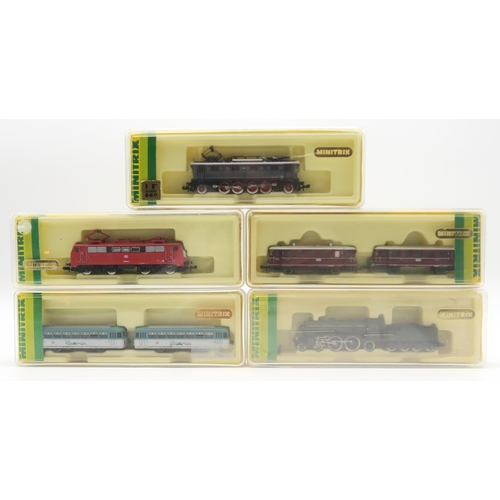 573 - A collection of Minitrix N-gauge model railway locomotives and stock; to include a 12035 steam locom... 