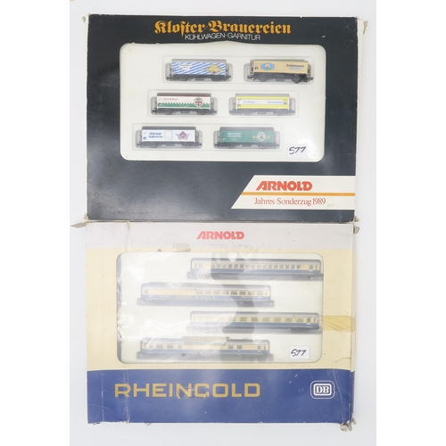 577 - A collection of boxed Arnold N-gauge model railway locomotives and stock, to include 0165 Jahres-Son... 