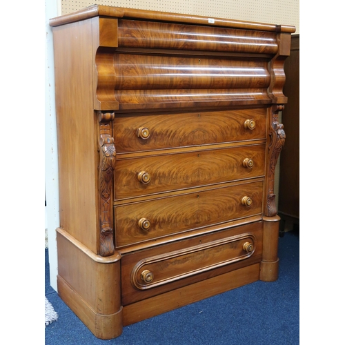 102 - A Victorian mahogany ogee chest with two long frieze drawers over three further long drawers on plin... 