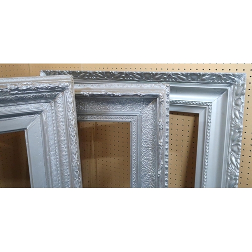 118 - A group of four large picture frames, likely gold leaf application underneath later paintwork. Sizes... 