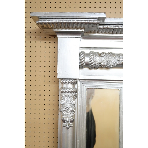 119 - A 19th century triple plate overmantel mirror, with a carved giltwood frame, later overpainted.... 