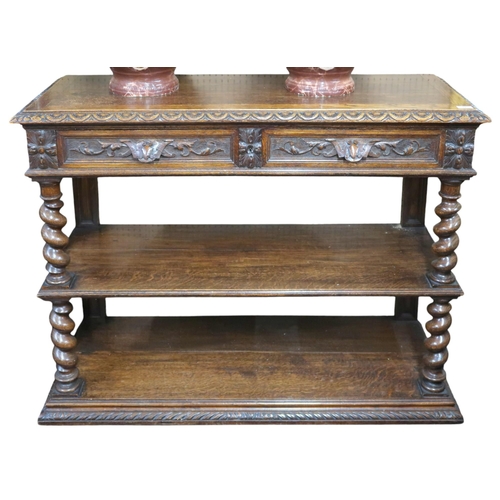 12 - A 19th century oak three tier buffet with two drawers over two open shelves divided by barley twist ... 