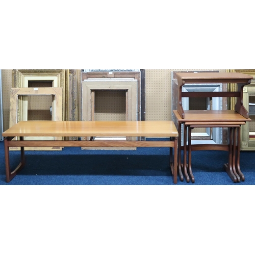 128 - A lot comprising a mid 20th century teak G Plan coffee table, 42cm high x 137cm long x 46cm deep, ne... 