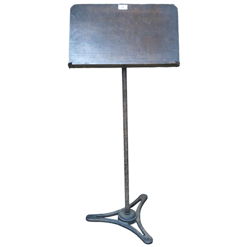 13 - A 19th century cast iron based freestanding music stand, 105cm high 