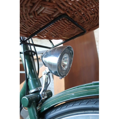 131 - A contemporary Pashley, Stratford upon Avon ladies bicycle with handlebar mounted basket, Lumotec he... 