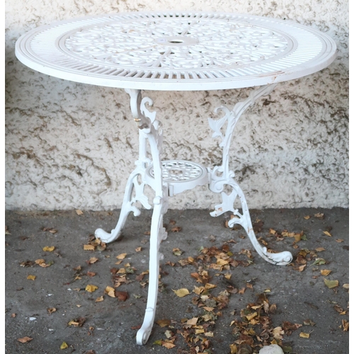 133 - A 20th century white painted metallic circular garden table, 68cm high x 80cm diameter