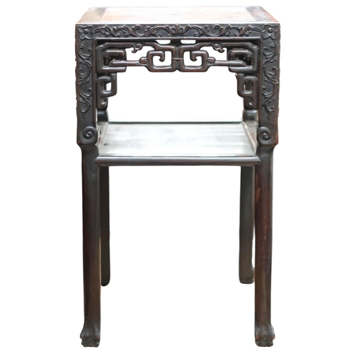 24 - A 19th century Chinese hardwood marble topped jardiniere stand with square marble inset top over car... 