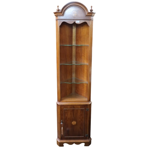 30 - A 20th century mahogany corner cabinet with three glazed open shelves over single cabinet door, 188c... 