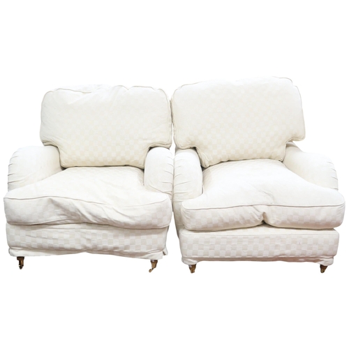 34 - A contemporary cream upholstered three piece suite comprising three seater settee, 78cm high x 197cm... 